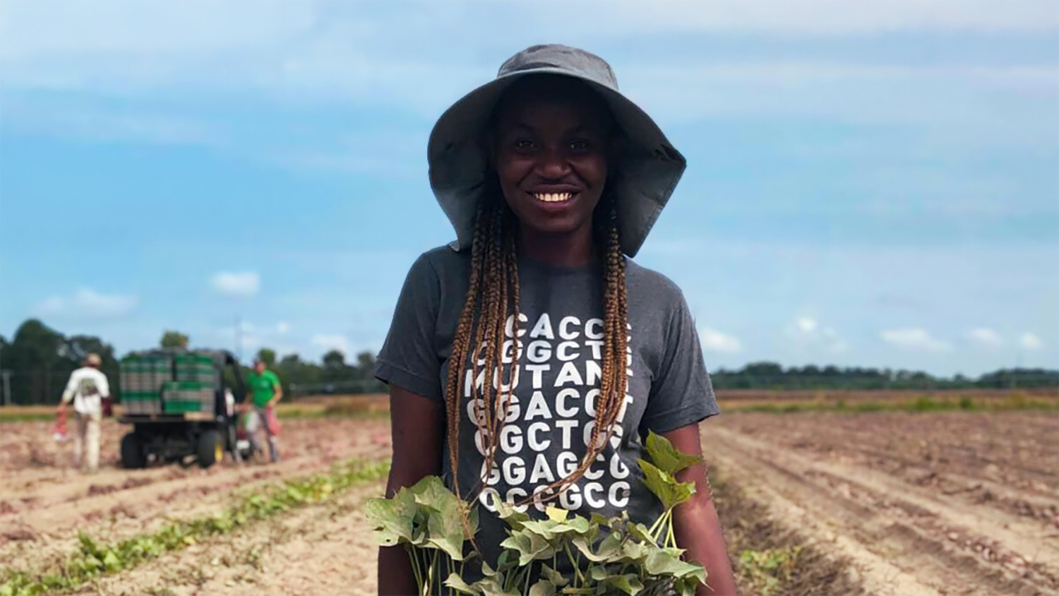 NC State faculty member Modesta Abugu in a Sweetpotato field in Clinton, North Carolina